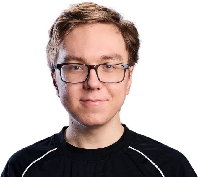Portrait of Thebausffs wearing glasses and a black jersey